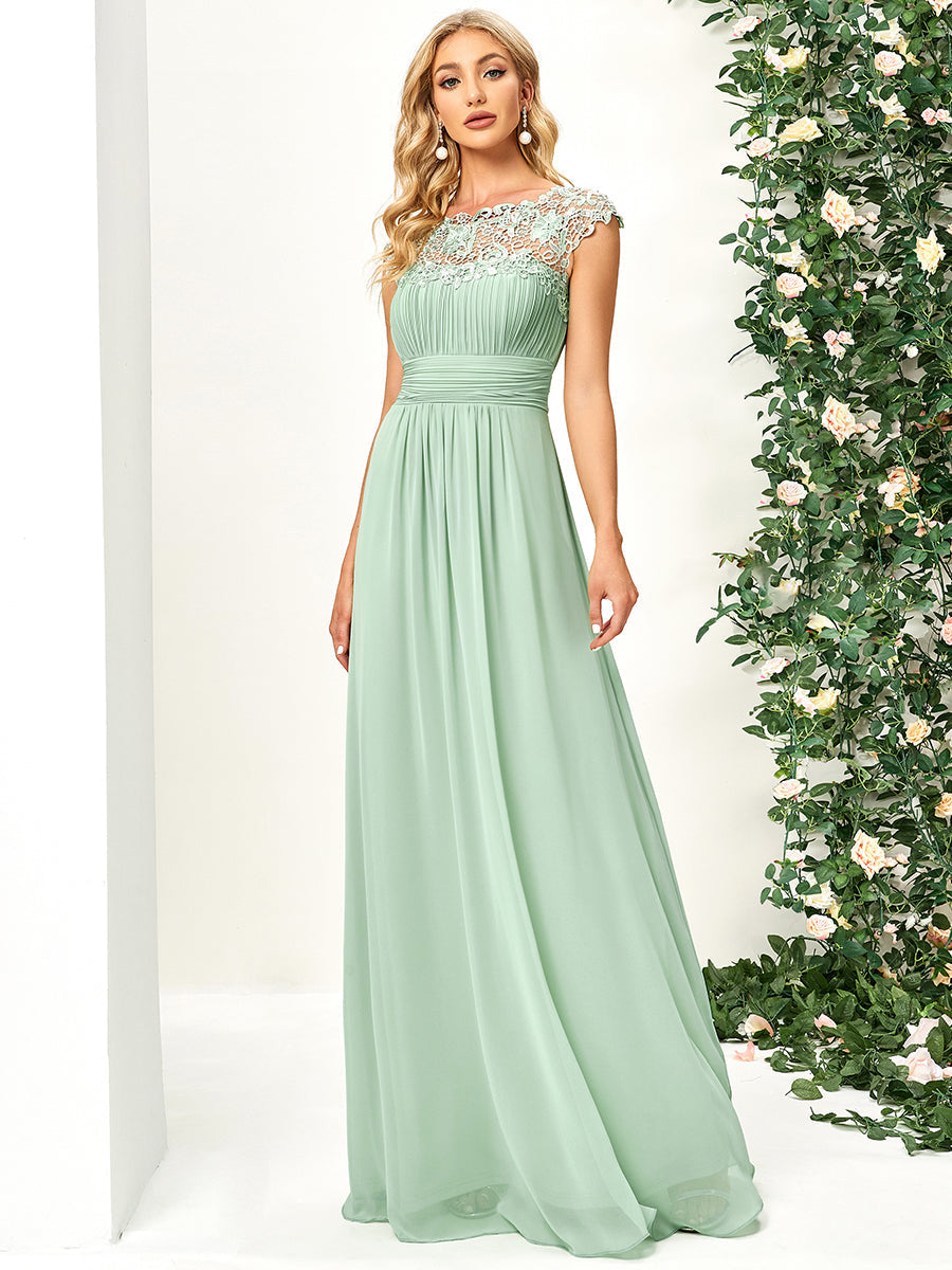 Chic Lace Cap Sleeve Evening Gown with Ruched Waist and Open Back